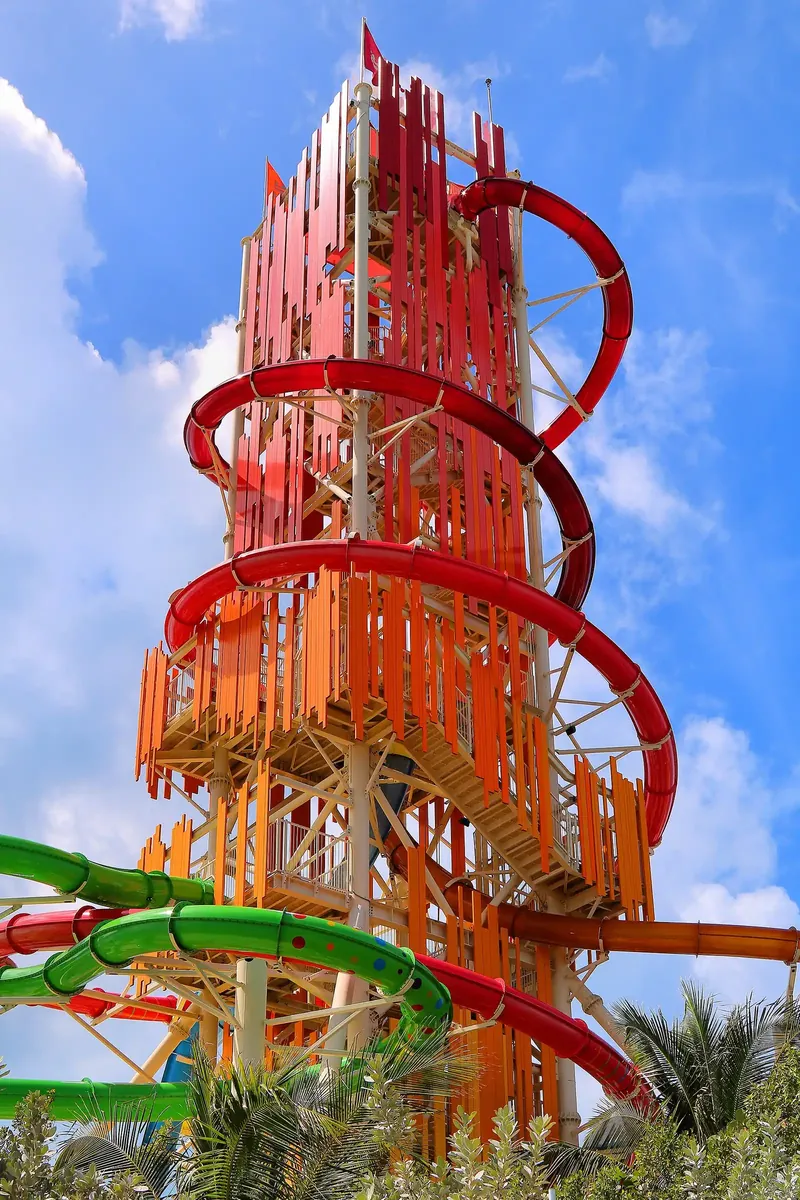 Tall tower of colorful waterslides at a Bahamas island waterpark